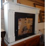 A 4' 10" modern white painted MDF and granite effect laminate fireplace surround with flanking