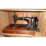 A late Victorian W. Sellers & Sons Stitchwell sewing machine in pine box