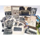 A small collection of early to mid 20th Century postcards and group shot photographs - sold with a