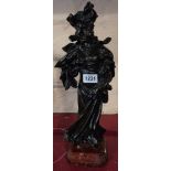 A bronzed spelter figure of a Victorian lady