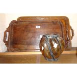 Two Indian carved wooden trays and an amber glass iron bound lampshade