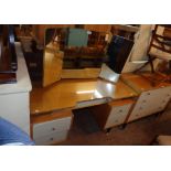 A 4' 1" 1960`s G-Plan light oak and part painted kneehole dressing table with triple mirror,