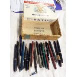 A collection of fountain pens including Waterman's 877 and 502, Parker Slimfold, Duofold, and