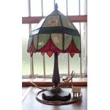 A handmade Tiffany style table lamp