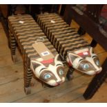 A pair of modern Egyptian style decorative painted wood cat pattern stools