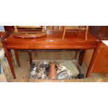 A 4' 6 1/2" reproduction mahogany console table with decorative pierced gallery and panelled