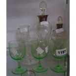A quantity of assorted glassware including two Edwardian silver topped decanters and associated