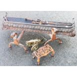 A quantity of assorted metalware including brass cannon, fender, a pair of fire dogs, etc.