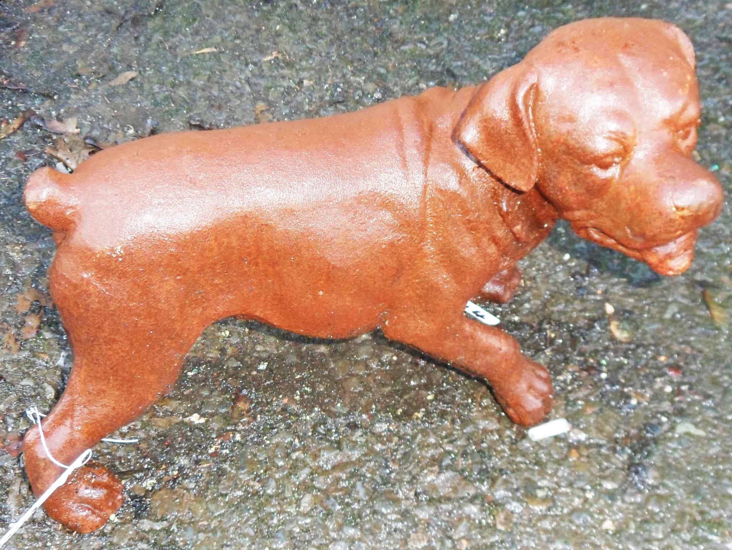 An iron standing dog