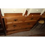 A 36" 20th Century pine chest of two short and two long graduated drawers, set on bracket feet -