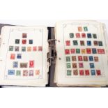 Two albums containing a collection of Victorian and later hinge mounted World stamps including