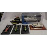 A box of die cast cars including Jim Clark's Lotus