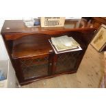 A 3' 8" polished oak effect side cabinet with recess shelf and shelves enclosed by a pair of