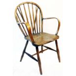 An antique country hoop stick back elbow chair with solid elm seat, set on simple turned supports