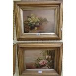 A pair early 20th Century oils on canvas one depicting waterside primroses, the other water lilies -