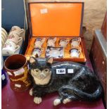 A Babbacombe pottery cat, a Dartmouth football mug and a boxed tea set