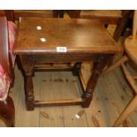 An 18" polished oak joint stool style tea table, set on turned supports