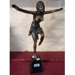 An Art Deco style bronzed figure of a female dancer stood on a plinth base