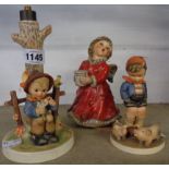 A Hummel lamp base, one musical figure and another