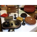 A box containing a quantity of assorted items including two Osbourne plaques, hardwood stands,