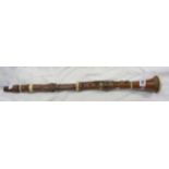 An early 19th Century boxwood and ivory bound clarinet with brass keys by Hermann Wrede of