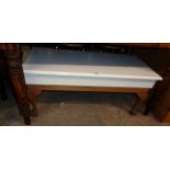 A 36 1/2" coffee table with painted top, set on cabriole legs with claw and ball feet