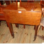 A 22" 19th Century mahogany drop-leaf table with drawer to one end and opposing dummy drawer