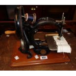 An antique Wilcox & Gibbs sewing machine