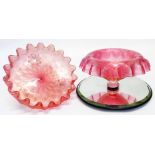 A cranberry glass table centre bowl and another
