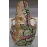 An Art Nouveau Amphora/Riessner & Kessel four handled vase decorated with roses