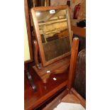 A 17 1/2" Victorian mahogany platform dressing table mirror with scroll supports and serpentine