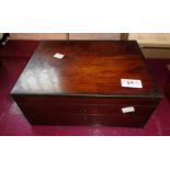 A Victorian rosewood and brass mounted box with lift top and drawer under