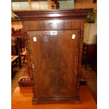 A 16 3/4" 19th Century inlaid mahogany cross banded and strung cabinet, set on bracket feet