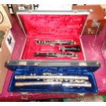 A cased Boosey & Hawkes clarinet - sold with a cased flute