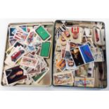 A tin containing a collection of assorted cigarette cards including John Player & Sons Aviation,