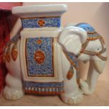A glazed elephant pattern stool - glued repair