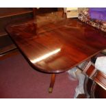 A reproduction mahogany D-end banqueting table in the Georgian style with three leaves, set on