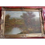 A 20th Century ornate gilt framed oil on canvas depicting a rural cottage in a landscape with pool