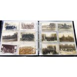 A box sleeved album containing mainly First World War and Boer War postcards including Tommy's