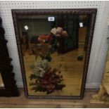 A early 20th Century stained gesso framed bevelled oblong wall mirror with painted floral decoration