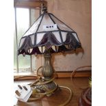 A handmade Tiffany style table lamp