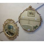 An 18" diameter vintage Aisonia bevelled wall mirror with ornate rope tassel border - sold with a
