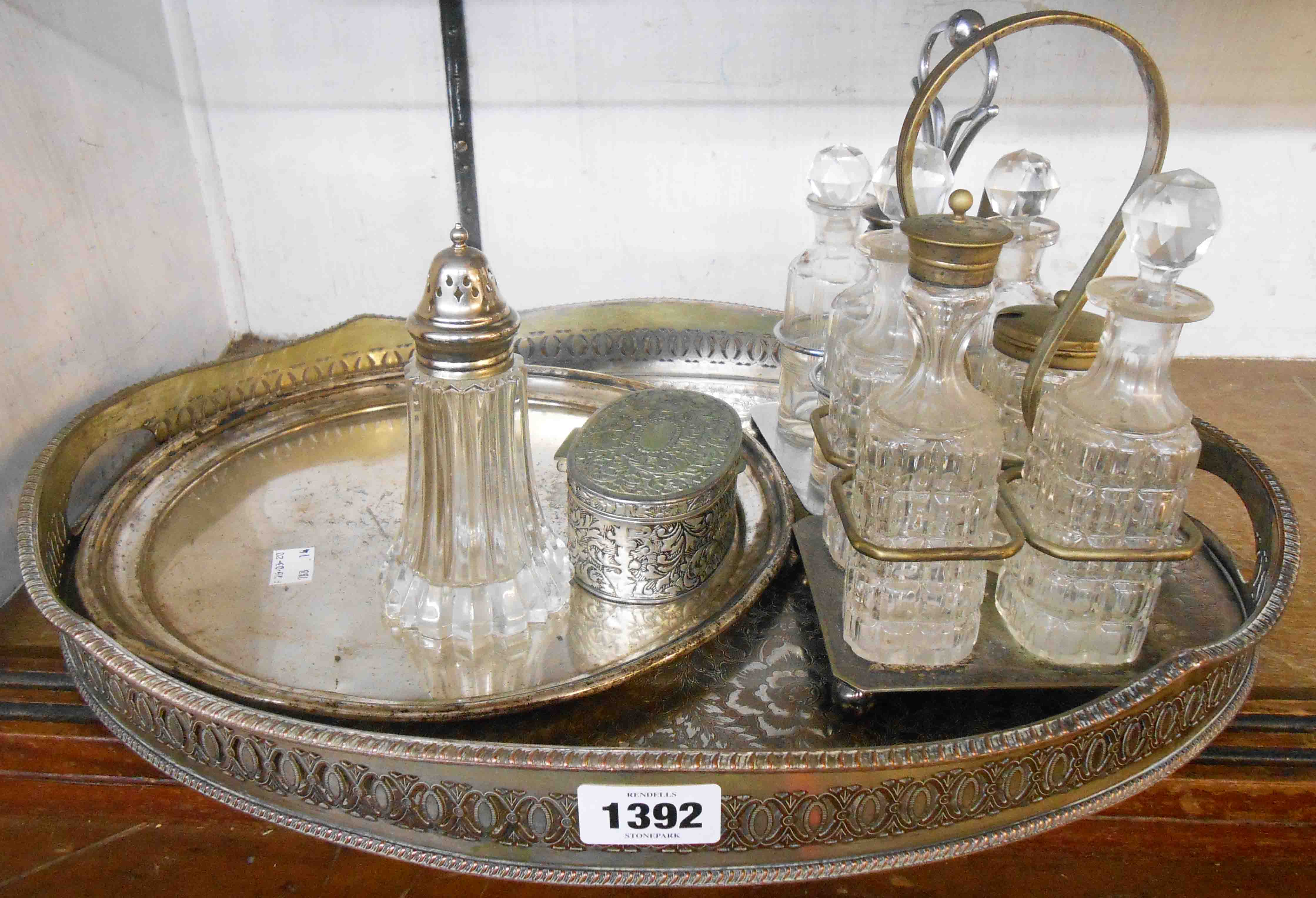 A large silver plated gallery tray, two cruet sets, etc.