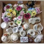 A box containing assorted china including a Nutbrown elephant pattern pie funnel, crested ware,