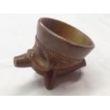 A South African Sotho clay pipe bowl in the form of a buffalo