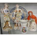 A pair of Sitzendorf style continental figures (1 a/f), a Dutch Delft 1945 commemorative plate,