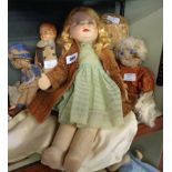 Seven vintage dolls including a DRP Co. with cloth body and composition head, plush example, Chad