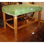 A vintage stained wood framed dressing stool with upholstered seat, set on moulded square supports