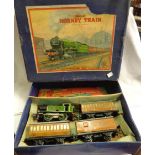 A vintage boxed Hornby O gauge clockwork train set comprising LNER 460 tank engine and three