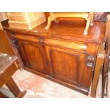 A 4' Victorian mahogany chiffonier with pierced scroll raised back, two blind frieze drawers,